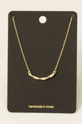 GOLD NECKLACE WITH A TWIST