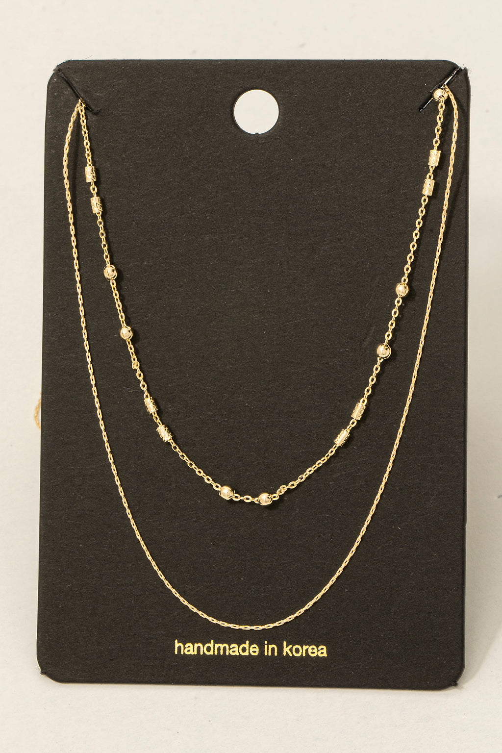 LAYERED GOLD NECKLACE