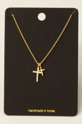 THREE CROSS NECKLACE