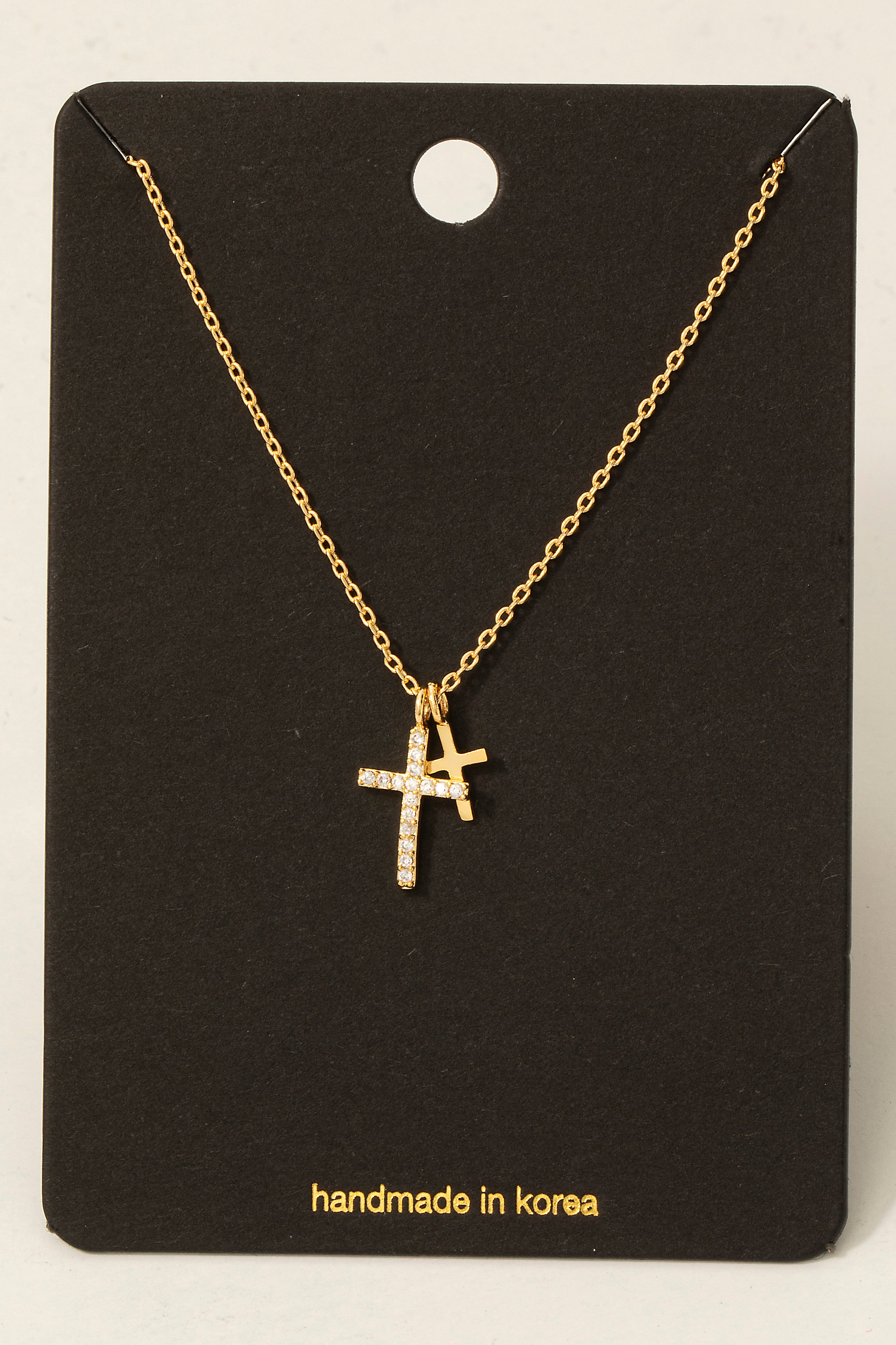 THREE CROSS NECKLACE